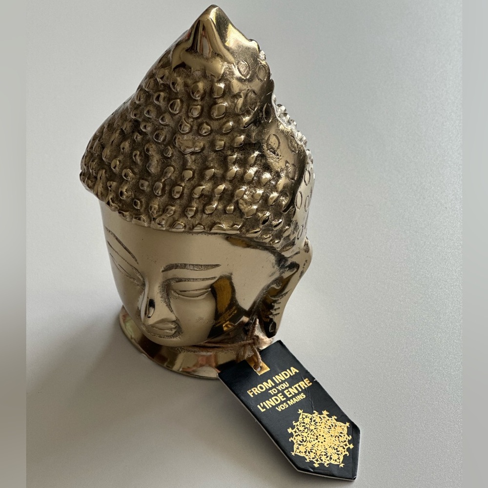 Golden Buddha head statue